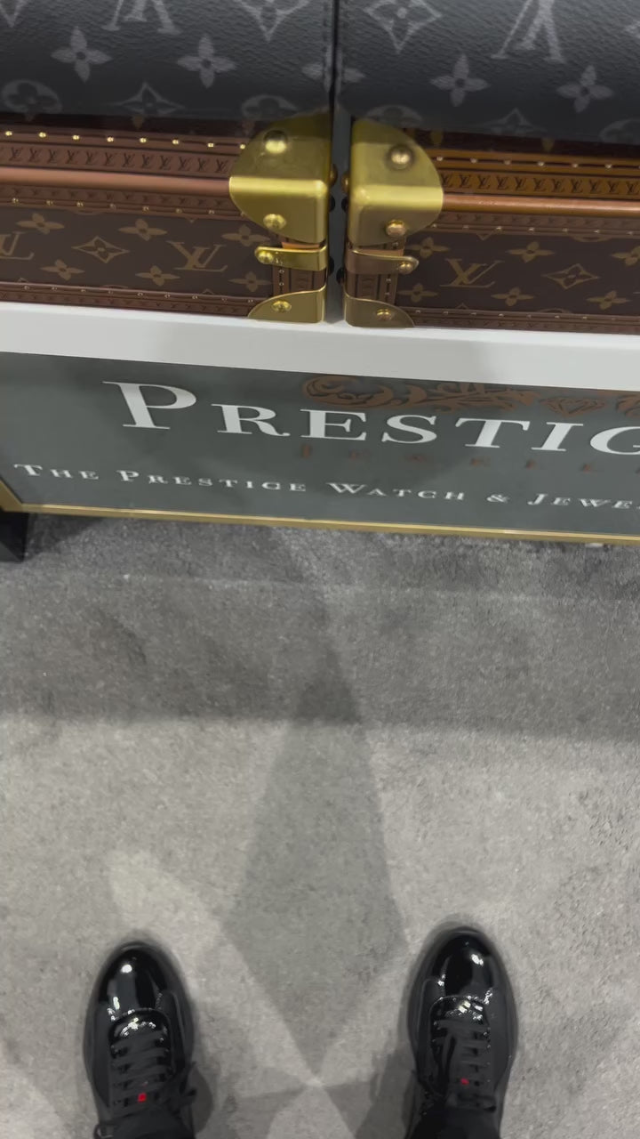 Rolex Sky-Dweller -  yellow gold with a bright green dial